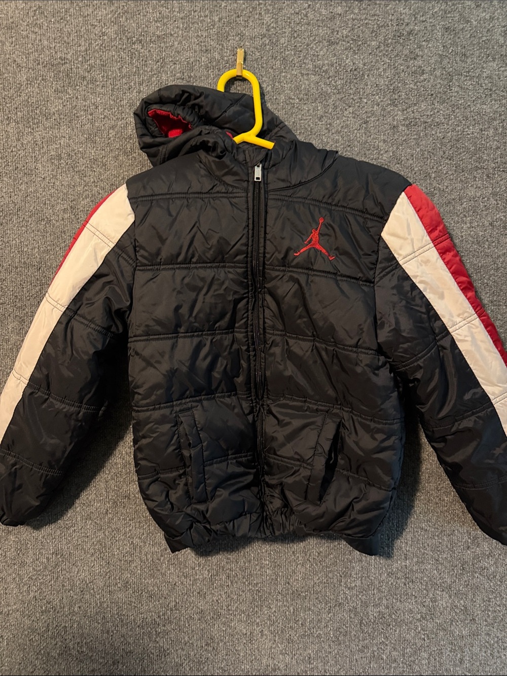 Jordan Black Puffer Jacket with Red & White Sleeve Stripes